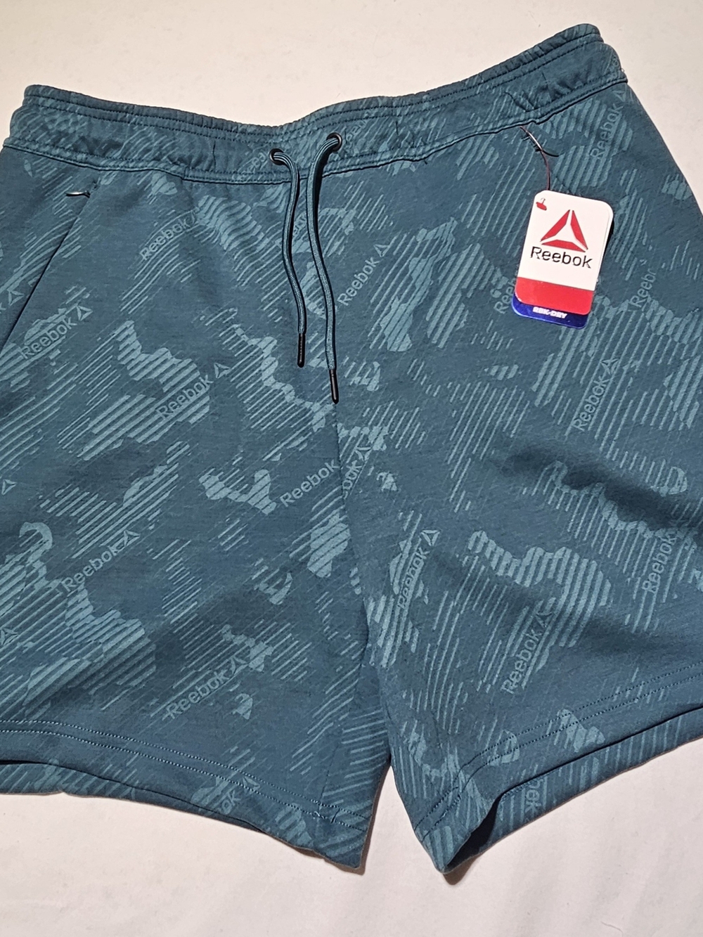 Reebok Men’s Teal Logo Print Athletic Shorts